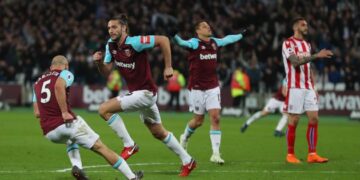 West Ham United 1-1 Stoke City: Andy Carroll's wonderful volley cancels out Peter Crouch's strike in basement battle