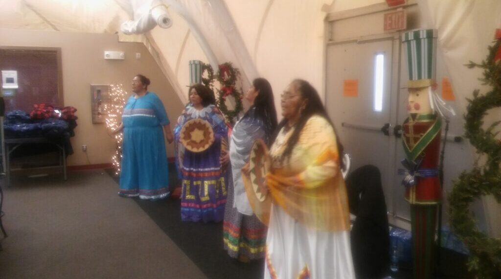 “Family of Indians” By: Clarence Gonzales
