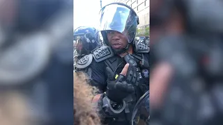 ‘I’d like to be out here helping you’: Atlanta police officer mediates with George Floyd protesters